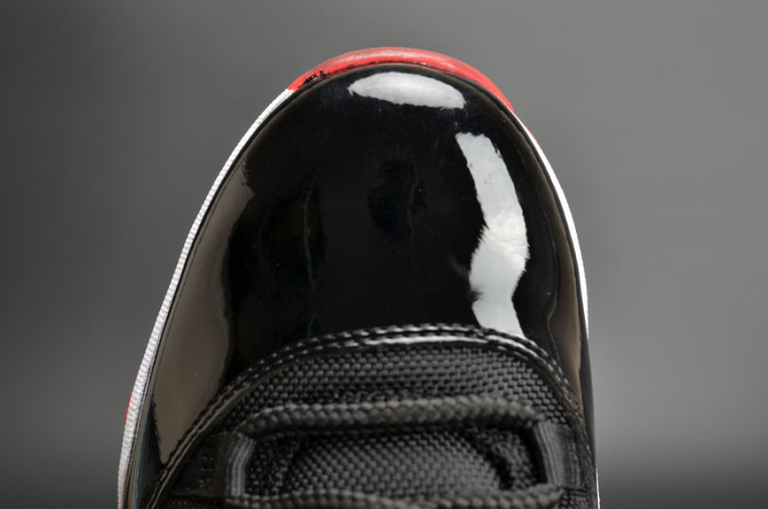 air jordan 11 retro low "bred" black/ red mens 528895-012
